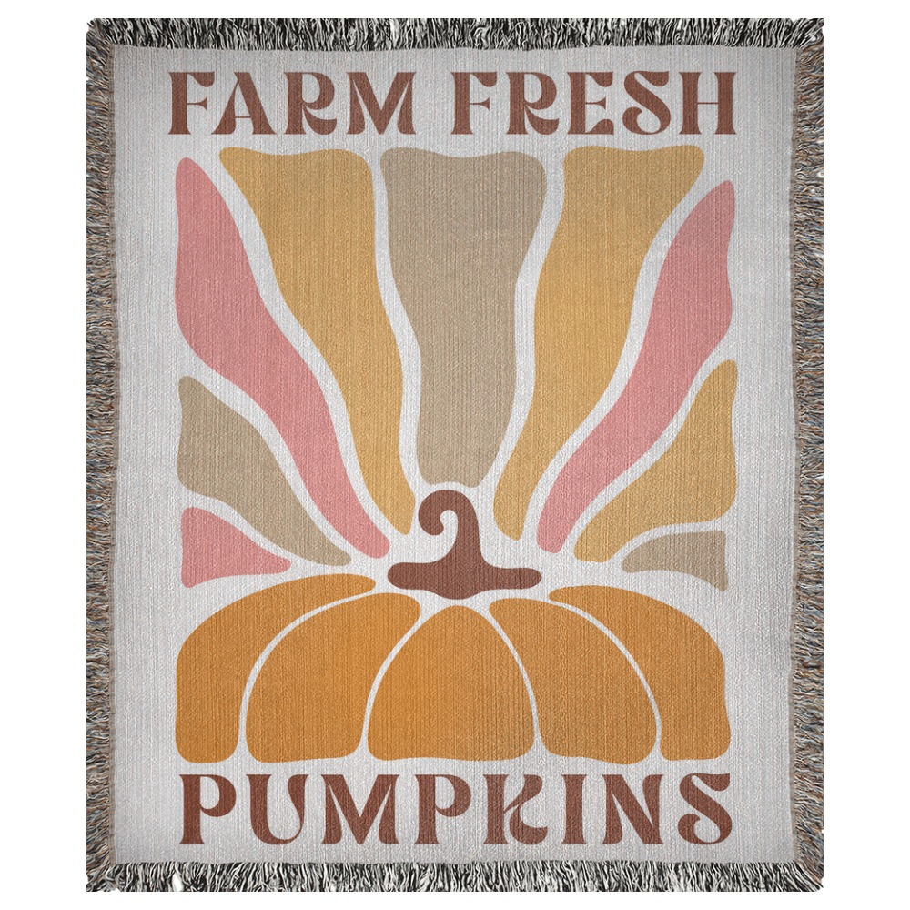 A 50x60 inch woven blanket depicting a bohemian-style pumpkin. It says "farm fresh pumpkins".