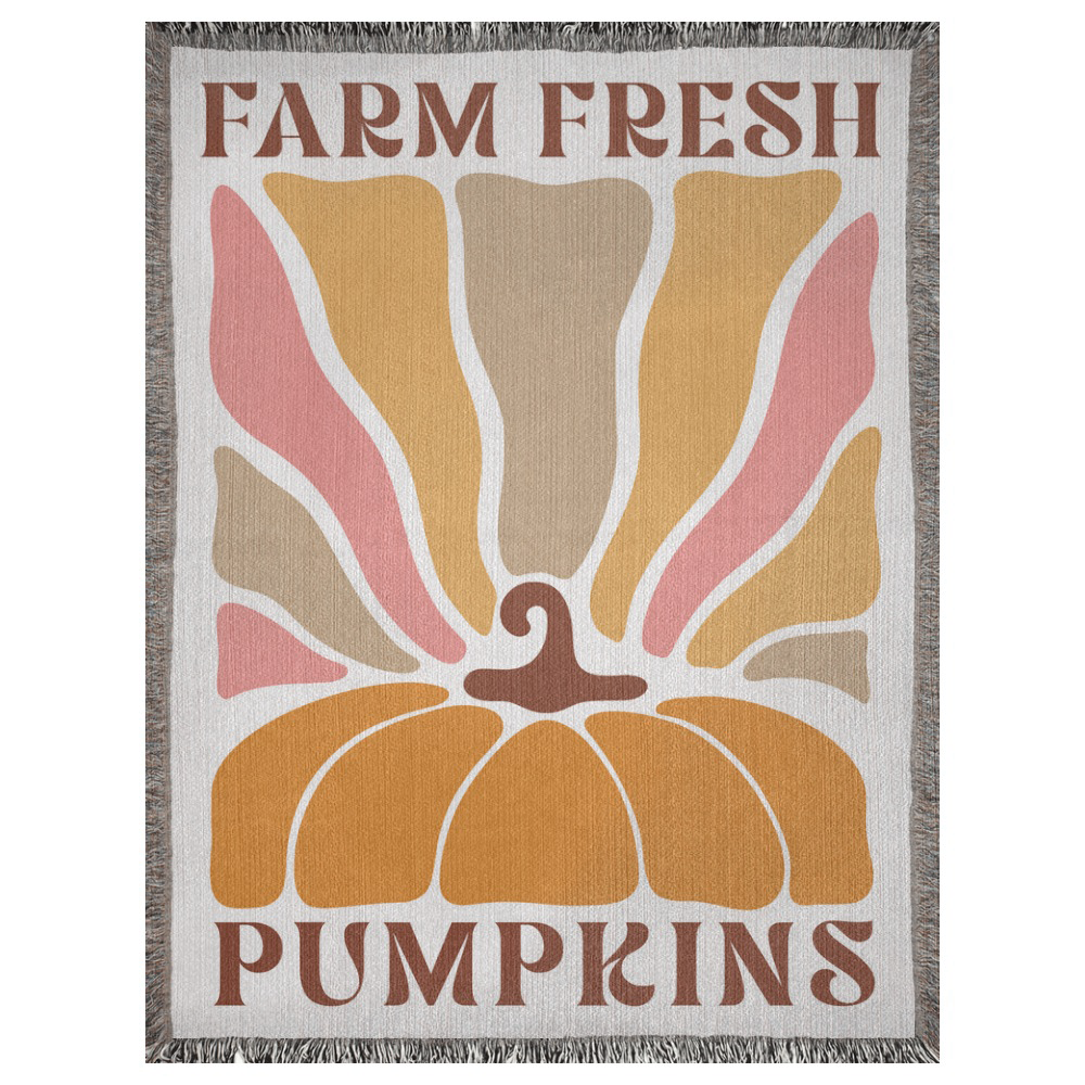 A 60x80 inch woven blanket depicting a bohemian-style pumpkin. It says "farm fresh pumpkins".