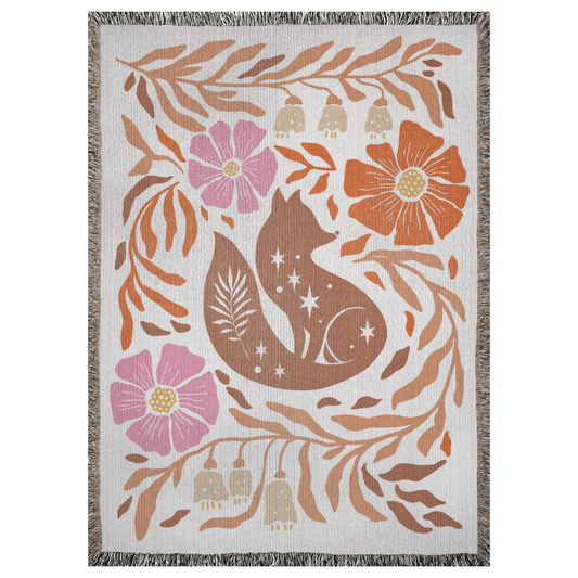 A 37x52 inch woven blanket depicting a bohemian-style fox with flowers and leaves.