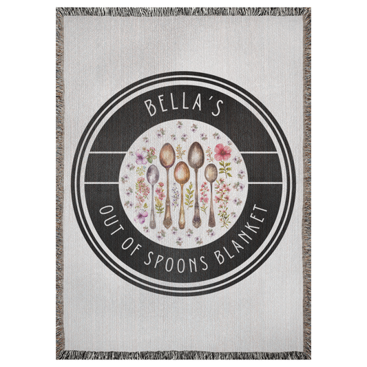 A personalized woven blanket depicting a pattern of watercolor wildflowers and vintage spoons. It says "Bella's Out of Spoons Blanket".
