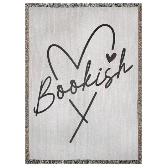 A 37x52 inch woven blanket depicting the outline of a heart with the word "bookish" written through it.