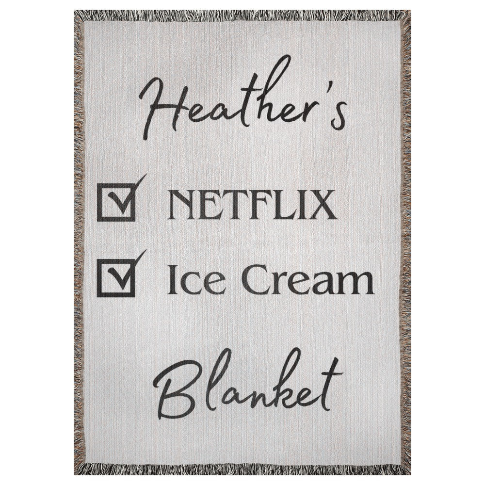 A personalized woven blanket with a name and checklist. This example says "Heather's Netflix Ice Cream Blanket". 