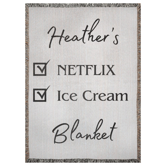 A personalized woven blanket with a name and checklist. This example says "Heather's Netflix Ice Cream Blanket". 